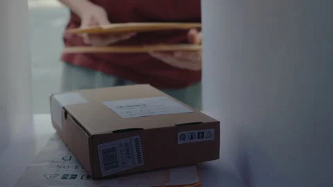 Getting Letters and Parcel out of the Mailbox Stock Footage 236983625