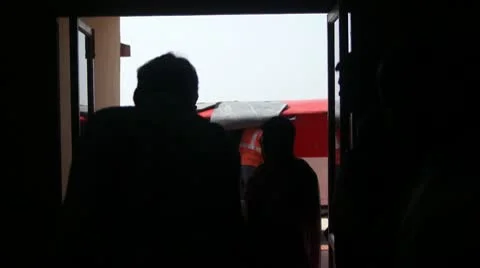 Getting luggage after a small plane flight in India Stock Footage 10800476