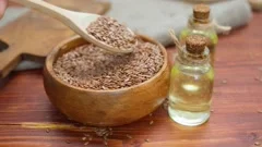 https://images.pond5.com/getting-oil-flax-seeds-linseed-footage-218582288_iconm.jpeg