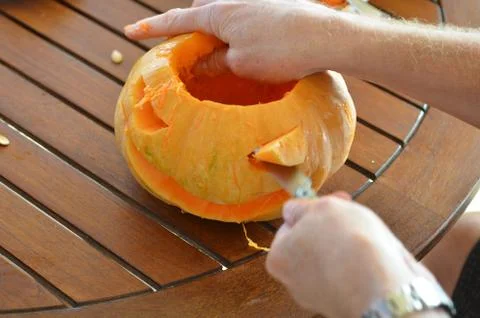 Getting pumpkin ready for halloween Stock Photos