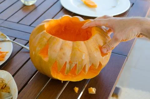Getting pumpkin ready for halloween Stock Photos
