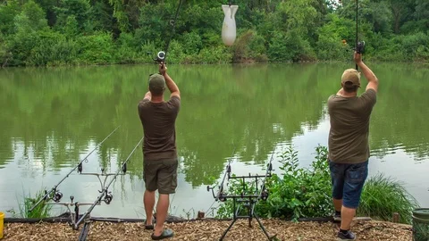 Getting ready and throwing a fishing rod into the lake Stock Footage 112184325