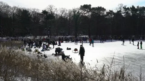 Getting ready to get on the ice people Stock Footage 148629372