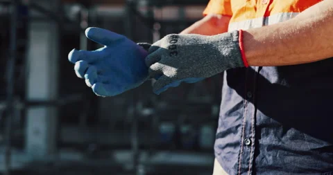 Getting ready, gloves and hands of man on construction site for architecture or Stock Footage 336791739