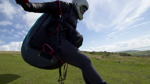 Getting ready to go paragliding, taking off 스톡 동영상 171283922