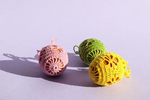 Getting ready for the holiday: three chicken eggs, decorated with a handmade  Stock Photos
