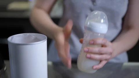 Getting Ready to Prepare Smoothie Ingredients in the Kitchen for Delicious Drink Stock Footage 301436537