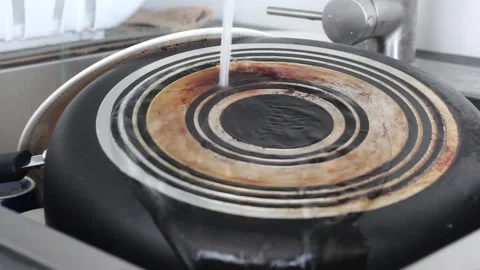 Getting Ready to Wash Dishes Stock Footage 237966471