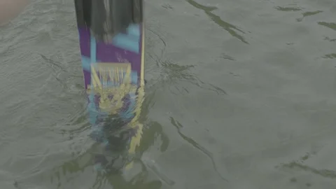 Getting ready to waterski Stock Footage 121660875