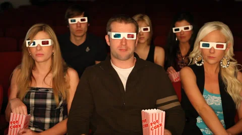 Getting Scared at the movies Stock Footage 35871371