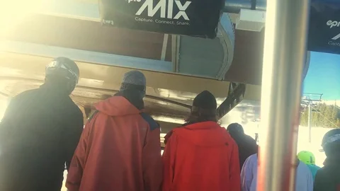 Getting on Ski Lift Stockbeeldmateriaal 84711239