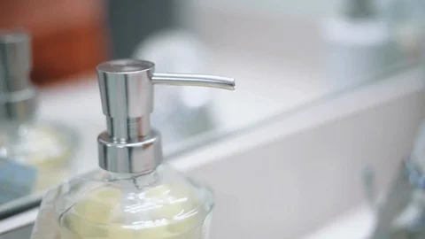 Getting soap from a soap dispenser Stock Footage 126549127