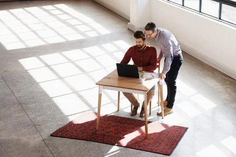 Getting some help from a colleague Stock Photos
