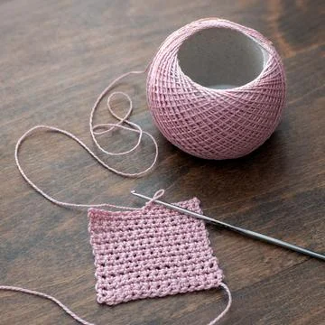Getting started with crocheting. Working with thread. Beginner crochet pattern 写真素材