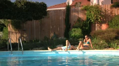 Getting Tan in the Pool Stock Footage 10921558