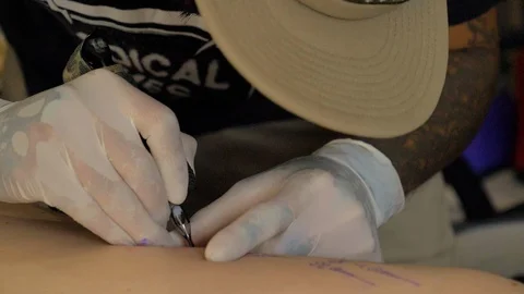 Getting A Tattoo Stock Footage 120546101