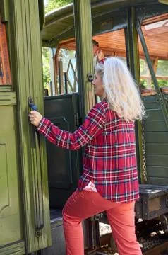 Getting on a vintage train Stock Photos