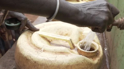 Getting Water From A Tap in slow motion. Stock Footage 320340786