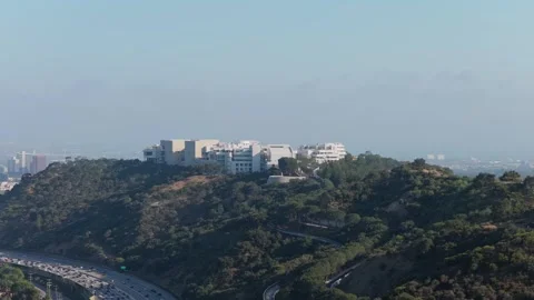 Getty Center Museum overlooking heavy traffic on interstate San Diego Freeway in Stock Footage 336635266