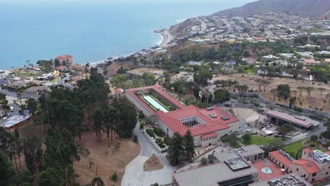 Getty Villa museum with Pacific Ocean backdrop and Malibu's luxurious real estat Stock Footage 336438693