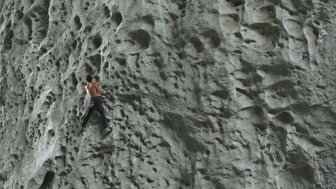 GETU,China, rock climber climbs difficult route at Great Arch crag Stock Footage 71391774