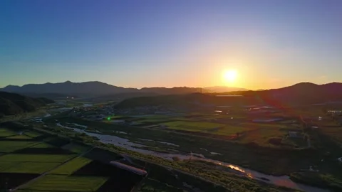 Geum River Winding Through Sunset Valley With Ginseng Fields in Geumsan Stock Footage 347725707