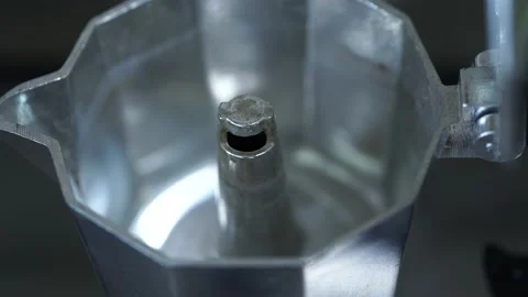 Geyser coffee maker. Coffee pours through the holes Stock Footage 135232880