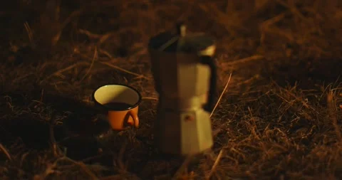 Geyser coffee maker in the light of a campfire close-up. Stock Footage 264488657