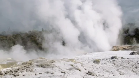 Geyser in Rotorua exploding with steam in the air Stock Footage 90314735