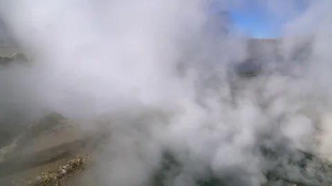 Geyser venting steam Stock Footage 73249989