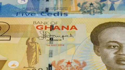 Ghana cedi notes fast tracking. Ghanaian money. Slider shot, low angle. 4K Video stock 126006787