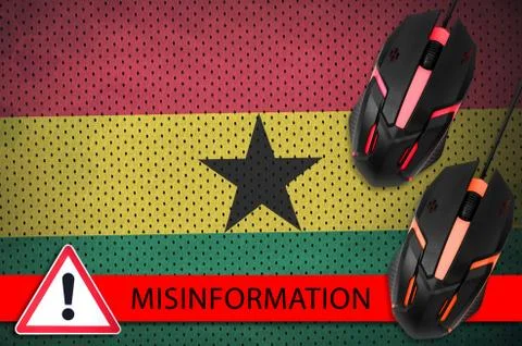 Ghana flag and two computer mouses. Misinformation during Coronavirus or 2019 Stock Photos
