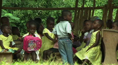 GHANA MEDIUM ON YOUNG PAKRO STUDENTS IN OUTDOOR CLASSROOM Stock Footage 57829727
