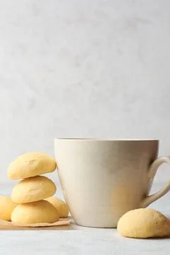 Ghee biscuits or cookies with a tea cup Stock Photos