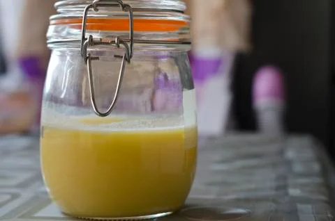 Ghee in Jar on the table in the kitchen Stock Photos
