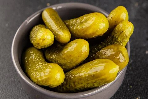 Gherkins pickled cucumbers vegetable appetizer healthy eating tasty snack f.. Stock Photos