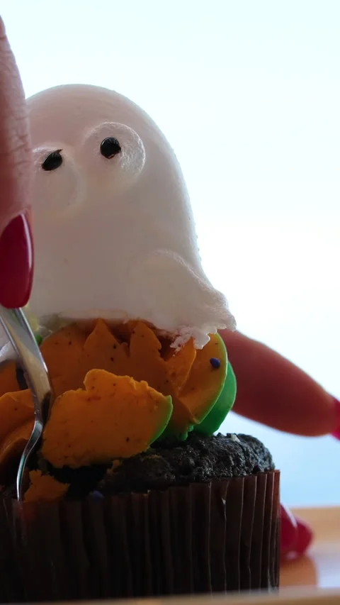 Ghost cookie Left to right zenithal pan showing Halloween shaped cookies, cups Stock Footage 316072231
