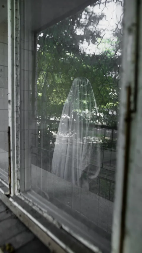 Ghost figure in room in front of a window. Scary scene halloween Stock Footage 313494747