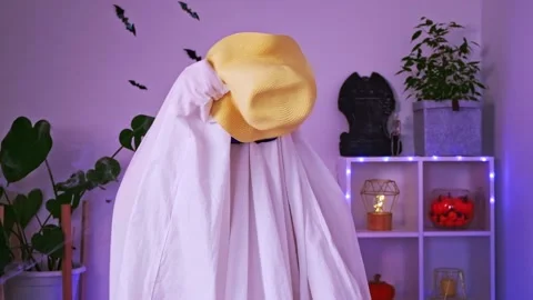 Ghost is getting ready vacation. Ghost goes on trip, travel, trip. Halloween Stock Footage 219966084