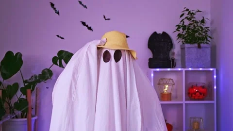 Ghost is getting ready vacation. Ghost goes on trip, travel, trip. Halloween Stock Footage 238501267
