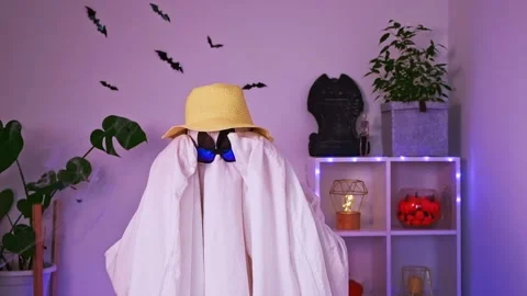 Ghost is getting ready vacation. Ghost goes on trip, travel, trip. Halloween Stock Footage 239278554