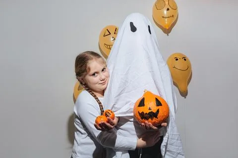 Ghost is holding a pumpkin Stock Photos