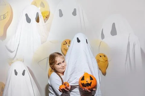 Ghost is holding a pumpkin Stock Photos