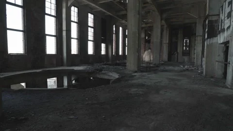 A ghost of a man appears in an old abandoned building. Stock Footage 112952297