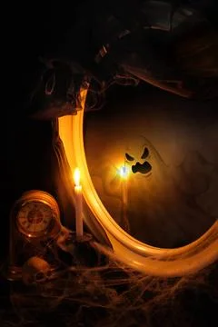 The ghost in the mirror Ghost reflection in the mirror on the table with a... Stock Photos