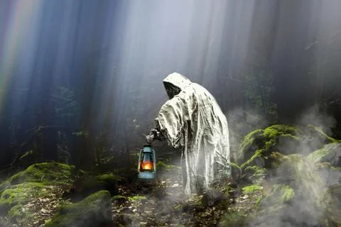 Ghost or  phantom with lantern in mysterious and magic forest .Concept. Stock Photos