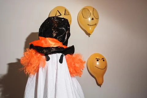 Ghost in orange wig and hat Stock Photos