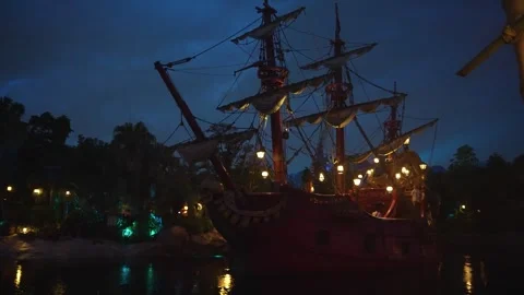 Ghost Pirate Ship Illuminated at Night, Theme Park Caribbean Attraction Stock Footage 342837839