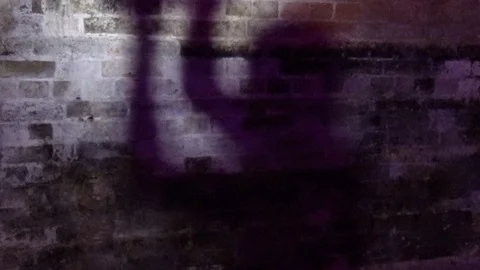 Ghost shadow man in chains 動画素材 106189685