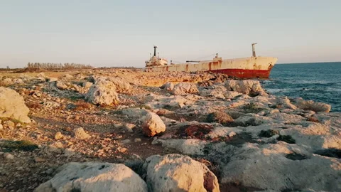 The Ghost Ship of Cyprus: Abandoned Freighter Rusts on Beach Stock Footage 173409620